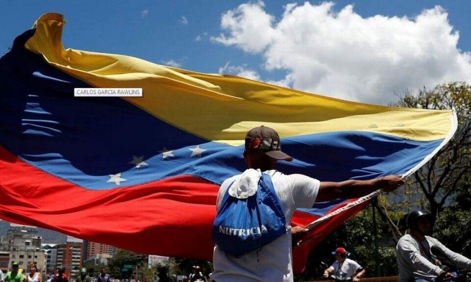 Venezuelanos nas ruas no país. Foto: Carlos Garcia Rawlins/Abr